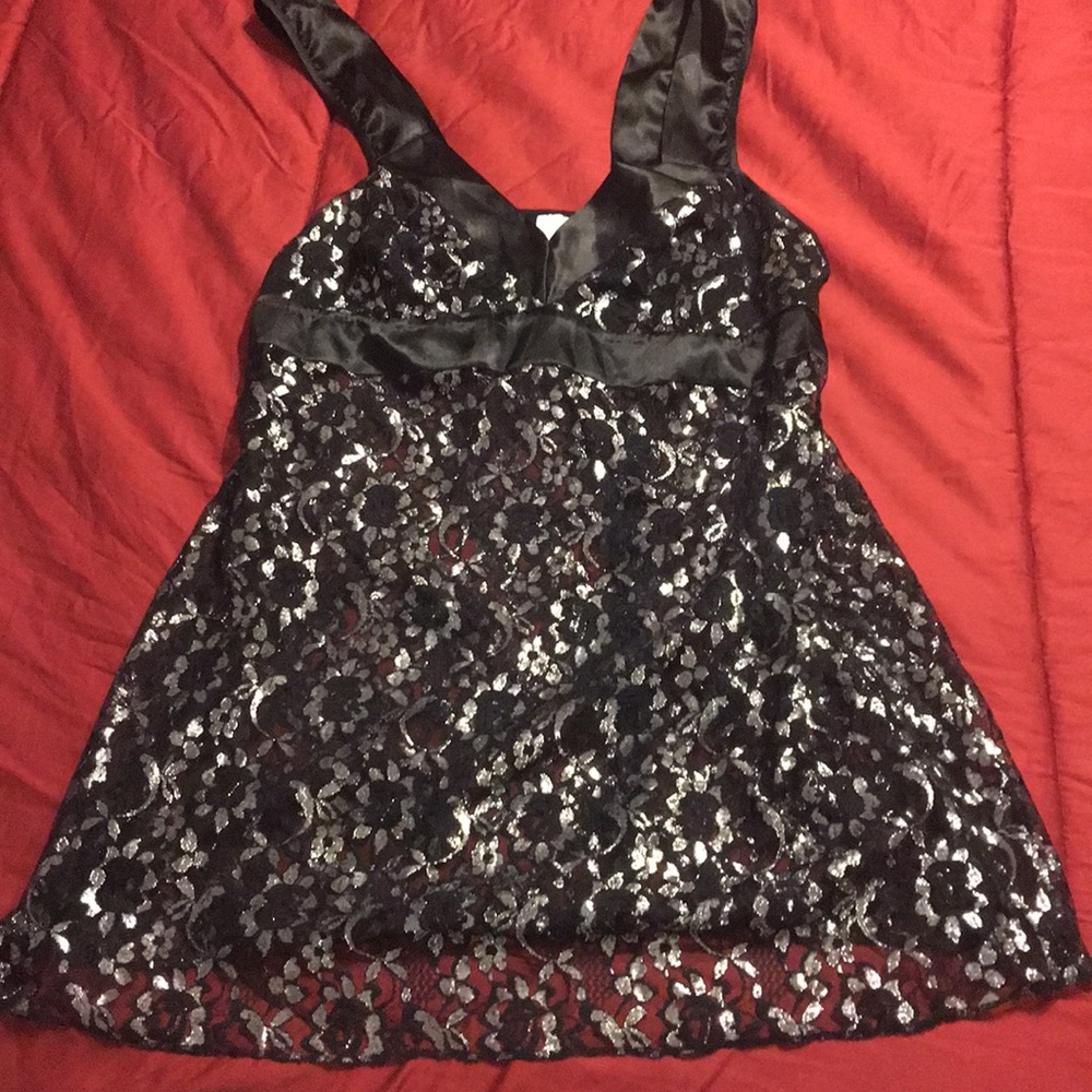Black/silver sheer top   Can wear with a shell.
